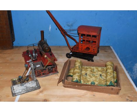 MAMOD; a tinplate steam engine, a tinplate crane, a DBW Toys tinplate printing press, and a water bucket lifter and a Burnett