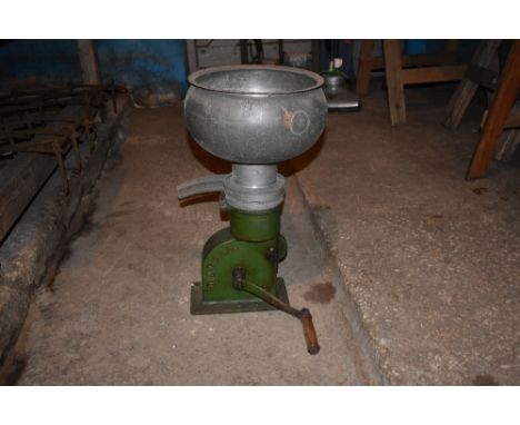 A Swedish Diablo cream separator, height 61cm.PROVENANCE: The Raymond Rush Collection. Mr Rush was an engineer, farmer and la