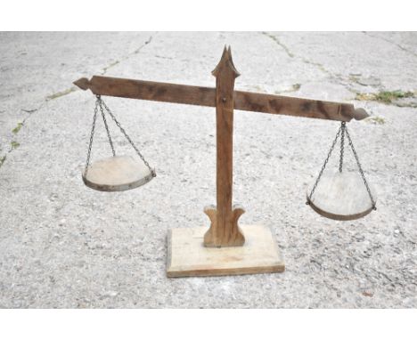 A set of rustic oak and pine scales, with chamfered rectangular base, height 48cm.PROVENANCE: The Raymond Rush Collection. Mr