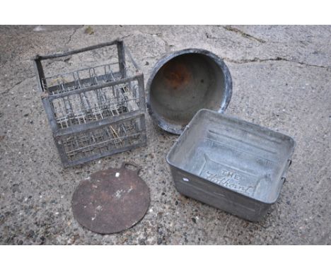 The Hotpoint Wash Tub, a vintage galvanised rectangular wash tub, length 50.5cm, also a pair of galvanised bottle crates and 