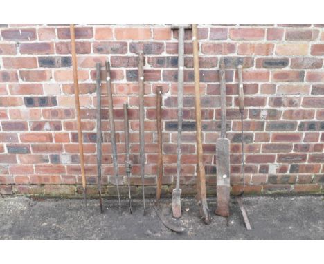 A collection of ten vintage agricultural cutting tools, hooks and scythes, various styles including hedge slashers.PROVENANCE