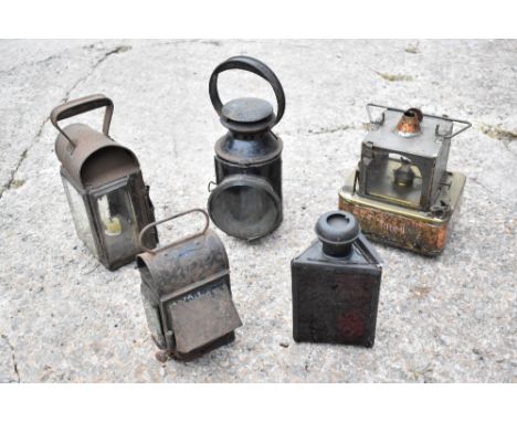 Five vintage lamps comprising a British Rail signalman's lamp, embossed B.R(M), height 30cm, a copper and metal rectangular l