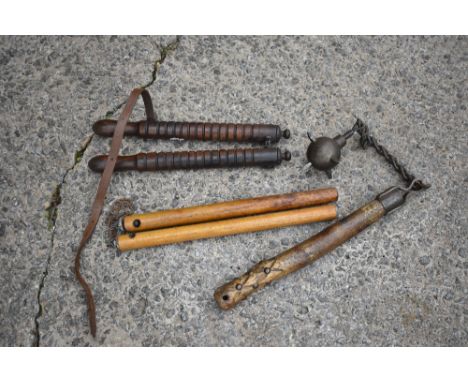 A treen and iron mace, overall length 71cm, also two turned wooden herdsman's tools (3).

PROVENANCE: The Raymond Rush Collec
