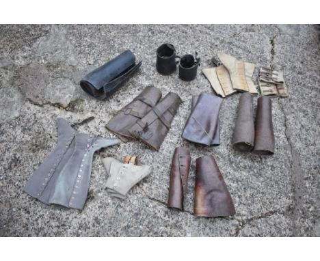 Eight tan leather gaiters, and two black leather wrist straps, seven cloth and canvas examples, and a Cooper Stewart tan leat