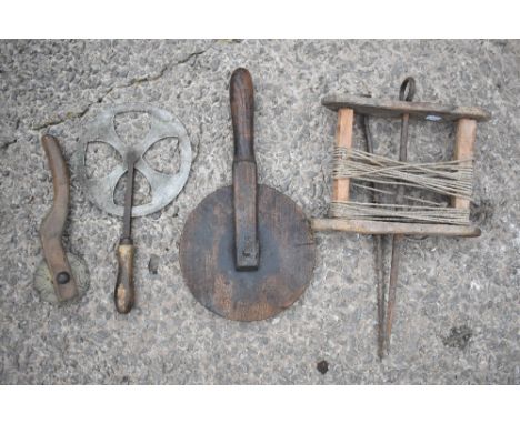 A vintage treen surveyor's measuring wheel, length 41cm, also an iron and steel example, a beech and brass measuring wheel an