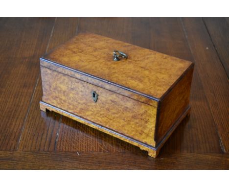 A Victorian amboyna box, with internal tray, on bracket feet, height 14cm, width 13cm, depth 18cm.PROVENANCE: The Raymond Rus
