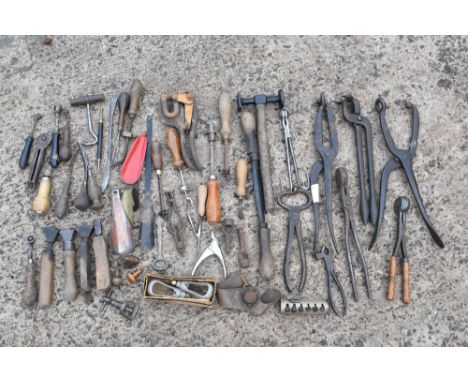 A collection of vintage agricultural and metalworking tools (quantity).PROVENANCE: The Raymond Rush Collection. Mr Rush was a