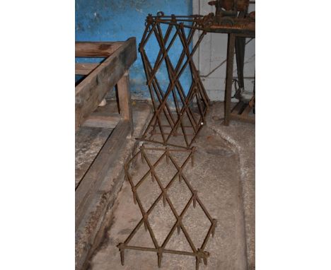 Four vintage wrought iron field arrows/chain arrows/harrows, length 100cm (4).PROVENANCE: The Raymond Rush Collection. Mr Rus
