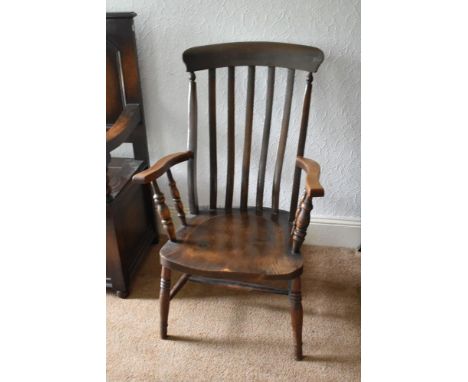 A 19th century beech and ash country kitchen chair with solid seat on turned legs, height 100cm.PROVENANCE: The Raymond Rush 