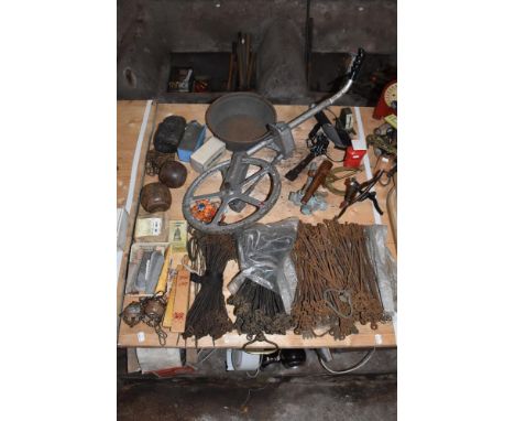 Three iron measuring chains and assorted vintage agricultural items, including a pair of ram balls.  PROVENANCE: The Raymond 