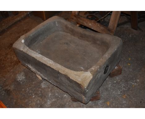 A vintage stone sink converted to a trough, height 25cm, width 77cm, depth 56cm, and a two section slate mantelpiece, width 1