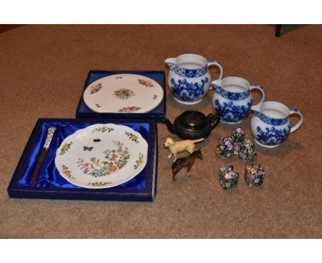 A collection of 19th century and later ceramics, to induce a black basalt teapot and cover, a set of three blue and white jug