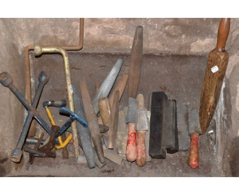 A large selection of vintage tools and metalware, including various chain sections, various weights, spanners, etc.PROVENANCE