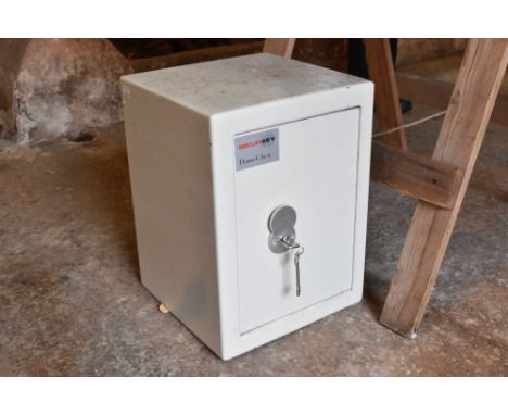 A Securikey home chest safe, with pair of keys, height 41cm.PROVENANCE: The Raymond Rush Collection. Mr Rush was an engineer,