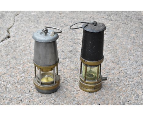A vintage brass and iron Davy lamp, with tinted yellow shade, height 23cm, also 'The Wolf Safety Lamp Co' miner's lamp (2).PR