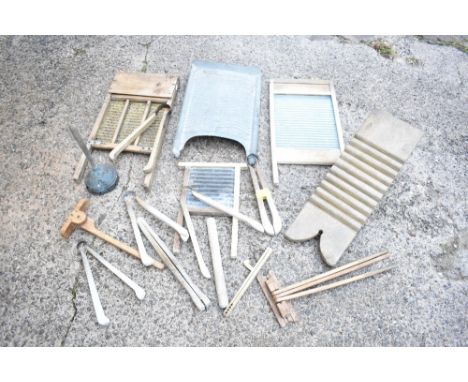 Five vintage wood, galvanised and glass washboards, height of tallest 60cm, also six vintage clothes pincers, two wash rugs, 