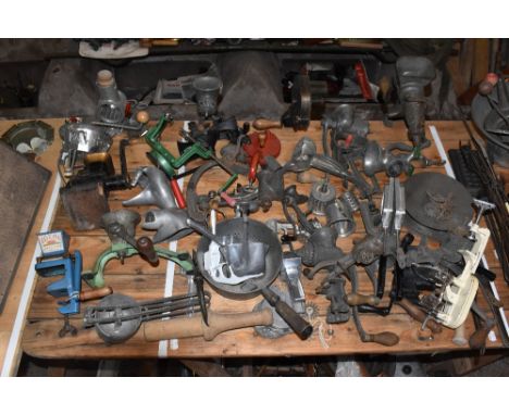 A large assortment of vintage meat mincers, various dates, styles and makers.PROVENANCE: The Raymond Rush Collection. Mr Rush