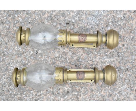 WHITE STAR; a pair of brass wall lamps, with bulbous glass shades and copper labels for White Star Liverpool, height 31.5cm.P