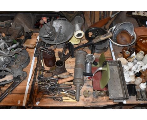 A collection of vintage toasting forks and kitchenalia items, including a food slicer and two flour sifters.PROVENANCE: The R