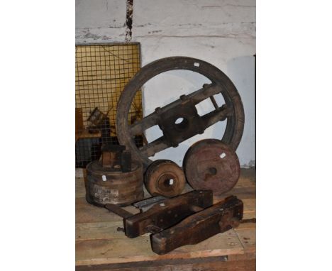 A vintage wooden wheel pattern, diameter 66cm, two circular wheel boss patterns, a smaller pattern, and a wooden and iron cla
