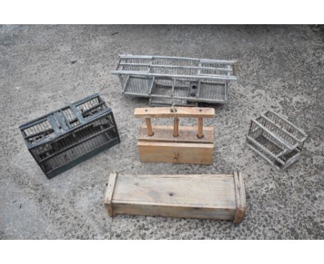 A vintage pine mousetrap, of tapering oblong form, length 50cm, also an animal trap in 19th century style and three bird cage