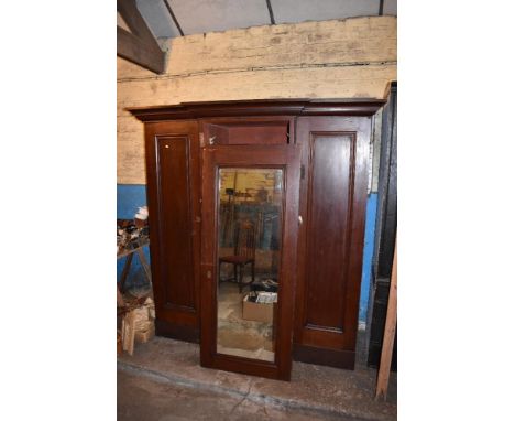 A Victorian stained pine breakfront wardrobe, height approx. 210cm, width 194cm (for restoration).PROVENANCE: The Raymond Rus