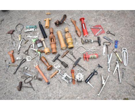 A collection of metal and treen corkscrews, 19th century and later, and a two treen bottle cork injectors.PROVENANCE: The Ray