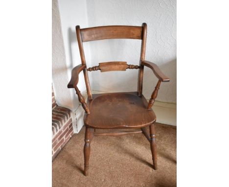 A 19th century beech and elm Oxford type country kitchen chair, the saddle seat stamped to the back 'HB16', on turned legs, h