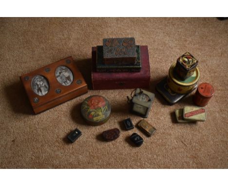 A French brass carriage timepiece, with Roman numeral dial, height 11cm, also four 19th century papier-mâché snuff boxes, a l