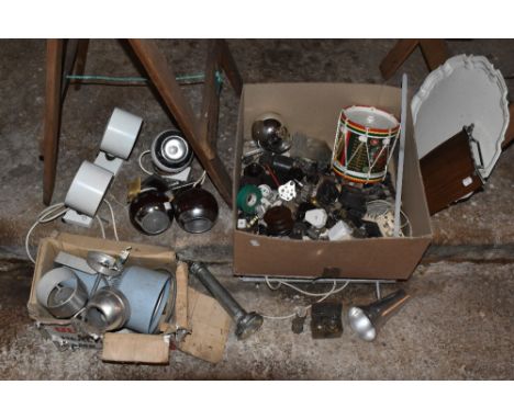 A collection of vintage kitchen items including pastry cutters, cooling racks, baking tins, also a selection of vintage light
