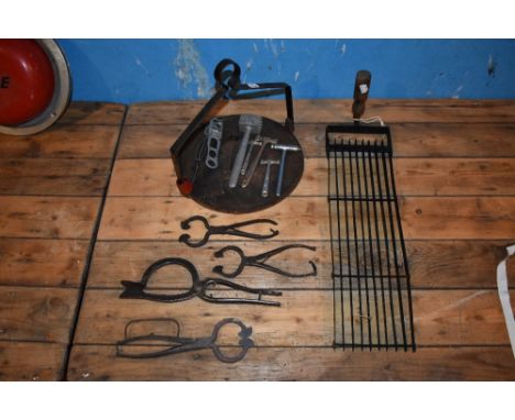 Five cast iron sugar cutters, a Welsh oak cake griddle pan, a cheese separator and other meat and toffee hammers, etc.PROVENA