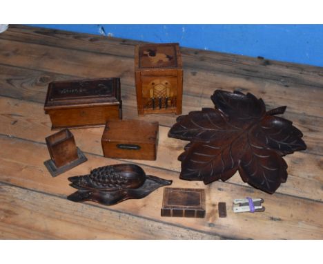 A collection of treen items, to include a a Black Forest type inkwell modelled as corn on the cob, a leaf shaped dish, a marq