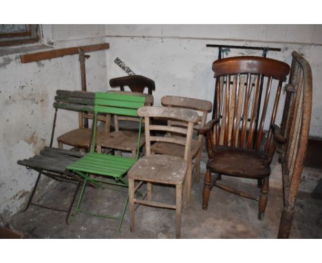 An assortment of vintage chairs comprising four ash chairs, two green folding chairs, a 1930s chair, a country kitchen chair,