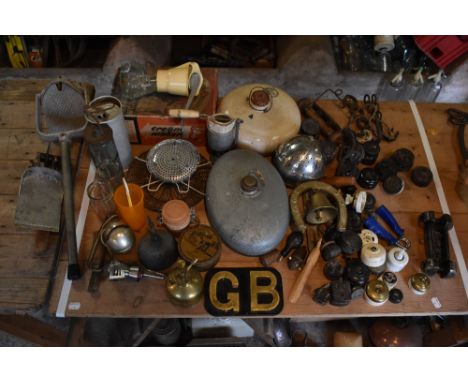 KITCHENALIA; an assortment of vintage and later kitchen and household items, including two foot warmers, a selection of brass