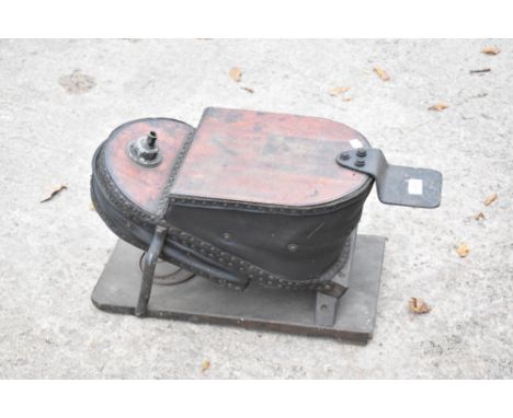A cast iron and wood vintage bellows, length 59cm.PROVENANCE: The Raymond Rush Collection. Mr Rush was an engineer, farmer an