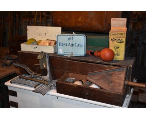 A selection of vintage medical and optical items, including a treen pharmaceutical pill tray, a selection of ointment tins, a