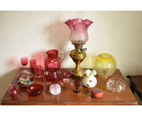 A collection of 19th century and later glassware, including a Burmese style opaque glass vase, a cranberry glass jug, and a b