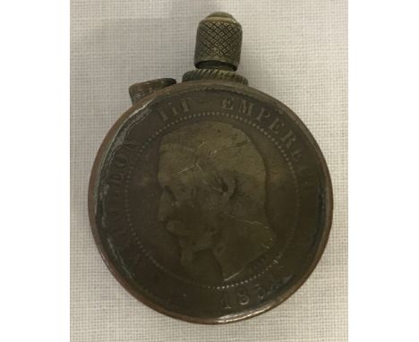 A WW1 trench art lighter. With copper coins to sides (George V and Napoleon III) 
