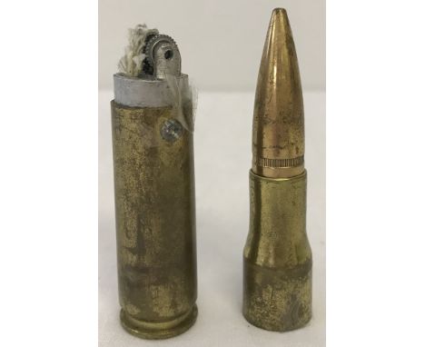 A WWII pattern 50 Cal trench art bullet lighter.  