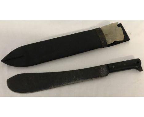 A WWII machete in leather scabbard (stud missing). Both sheath and blade dated 1944. Crown motif and No 125 also visible on b