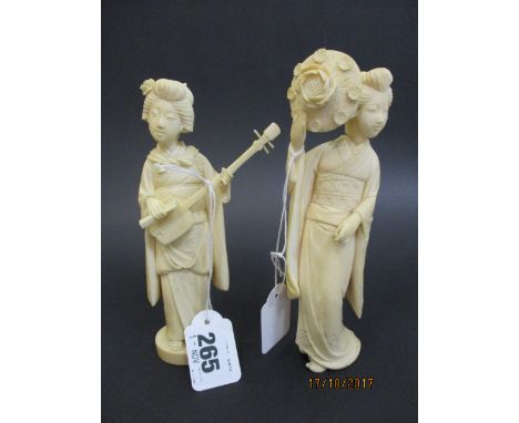 An early 20th century Japanese Okimono, carved ivory figure of a female playing a string instrument, on a circular base and c