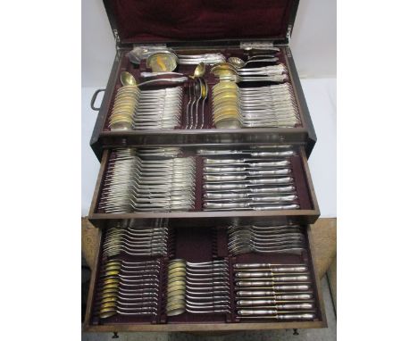 An early 20th century German silver canteen of cutlery with lobed terminals comprising twelve table forks, twelve table knive