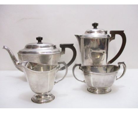 A matched four piece silver teaset by William Neale & Son, Birmingham 1935 and 1936 of rectangular form with faceted corners,