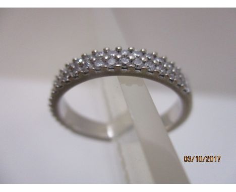 An 18ct white gold, two row diamond set, half eternity style ring, 4.6g