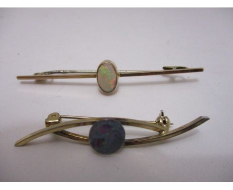 Two 9ct gold brooches, each set with an opal coloured cabochon, 5.7g