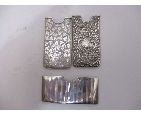 Three late 19th/early 20th century open topped card cases with embossed, engraved and engine turned decoration, mixed marks 8