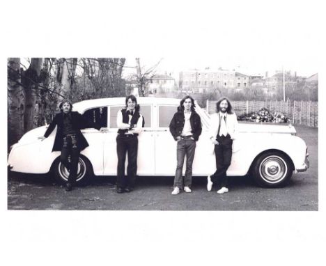 Beatles UNSIGNED Large black and white A3 sized photo print, unsigned, of The Beatles standing in front of a Rolls Royce. Nic
