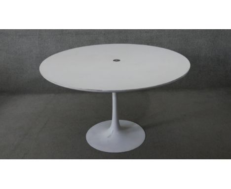 A vintage Eero Saarinen style 'Tulip' dining table with composite laminated top on aluminium base. 