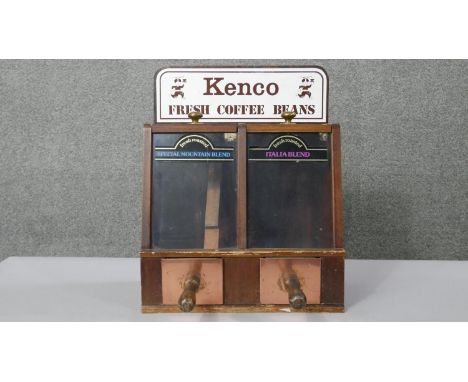 A vintage Kenco coffee dispenser with metal scoops with wooden handles, labels to front. H.48 W.38 D.37cm 
