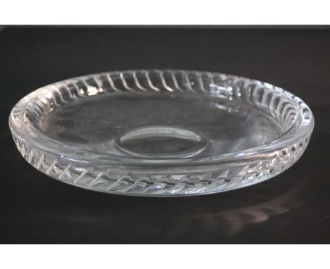 A large heavy vintage art glass bowl. The rim with a hand cut diagonal semi-circular design. 
H.6 Diameter. 30 cm. 